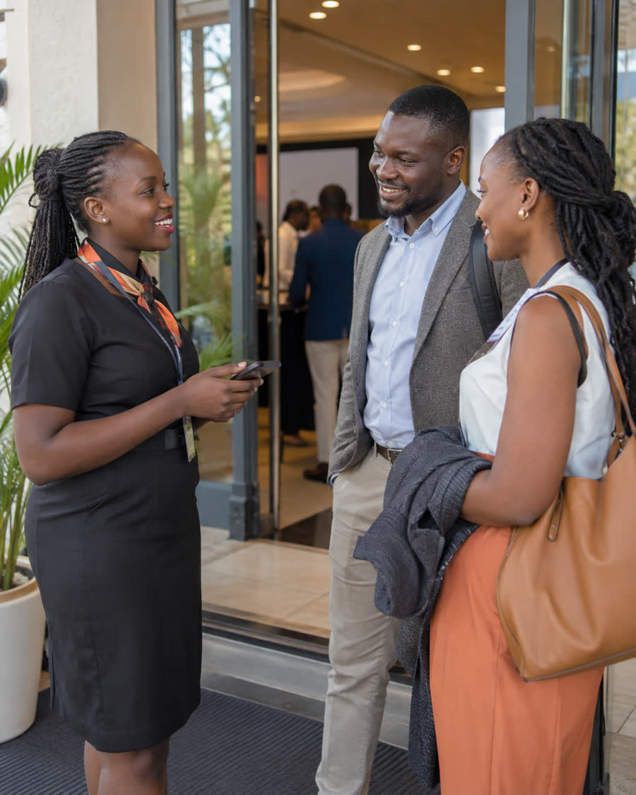 Guests being welcomed at an event entrance